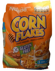 Nestlé Corn Flakes Miód i orzeszki Płatki śniadaniowe z miodem i orzeszkami 250 g